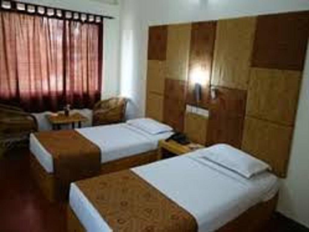 Dejavu Hotel Coimbatore Kamer foto
